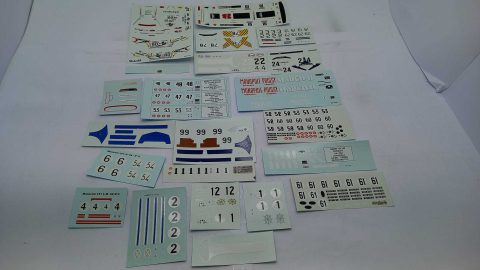 Lotto di 23 decals assortite per modelli in scala 1/43