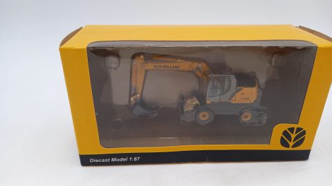 New Holland escavatore gommato WE170 1/87, confezione lievemente usurata