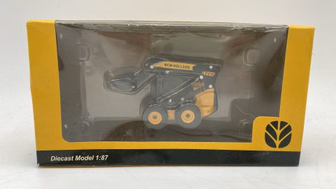 Newholland minipala gommata L175 scatola leggermente rovinata 1/87