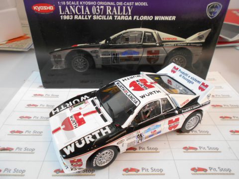 Kyosho Lancia 037 Rally Targa Florio 1983 1/18, scatola lievemente usurata