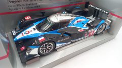 Minichamps Peugeot 908 HDI FAP winners Le Mans 2009 1/18, confezione usurata - scala 1:18