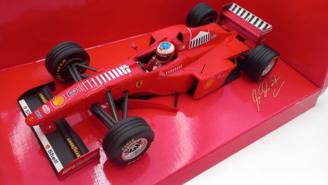 Minichamps Ferrari F310B M. Schumacher 1998 launch version 1/18, confezione lievemente usurata