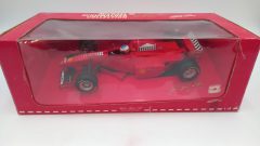 Minichamps Ferrari F310B M. Schumacher 1998 launch version 1/18, confezione lievemente usurata - foto 7